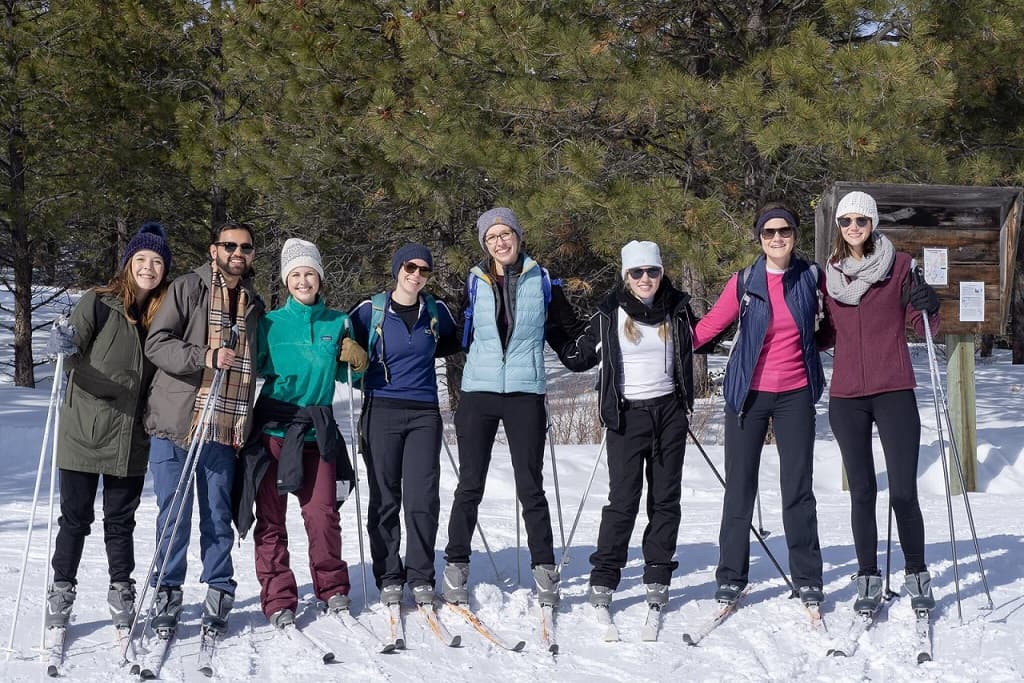 Residents from the class of 2021 on cross-country skis in the snow